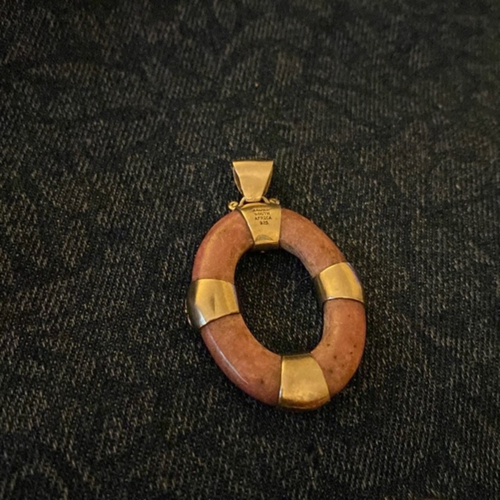 From South Africa as marked and is 925 pendant I believe stone is rhodenite